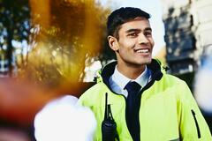 man in yellow visibility coat