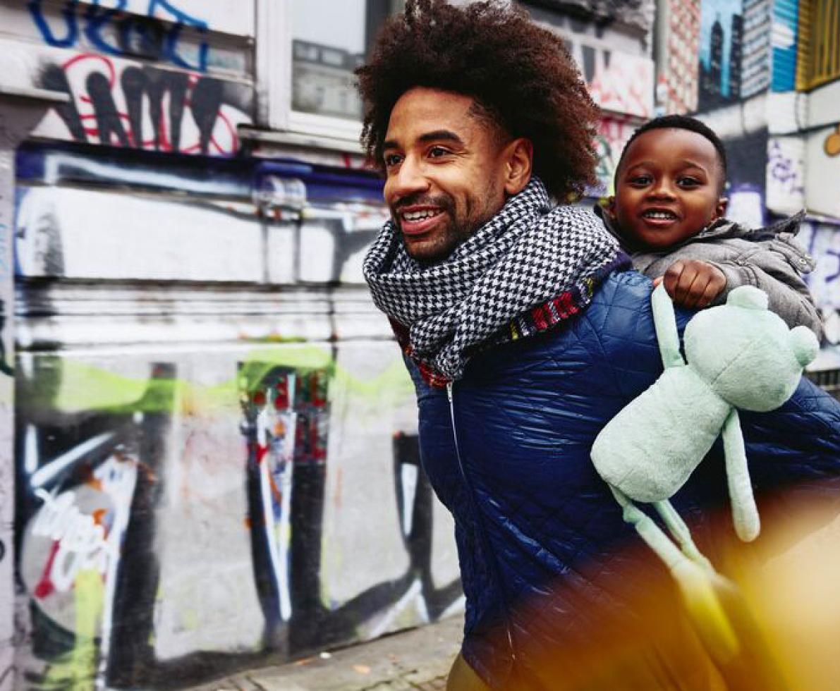 man carrying baby man carrying baby