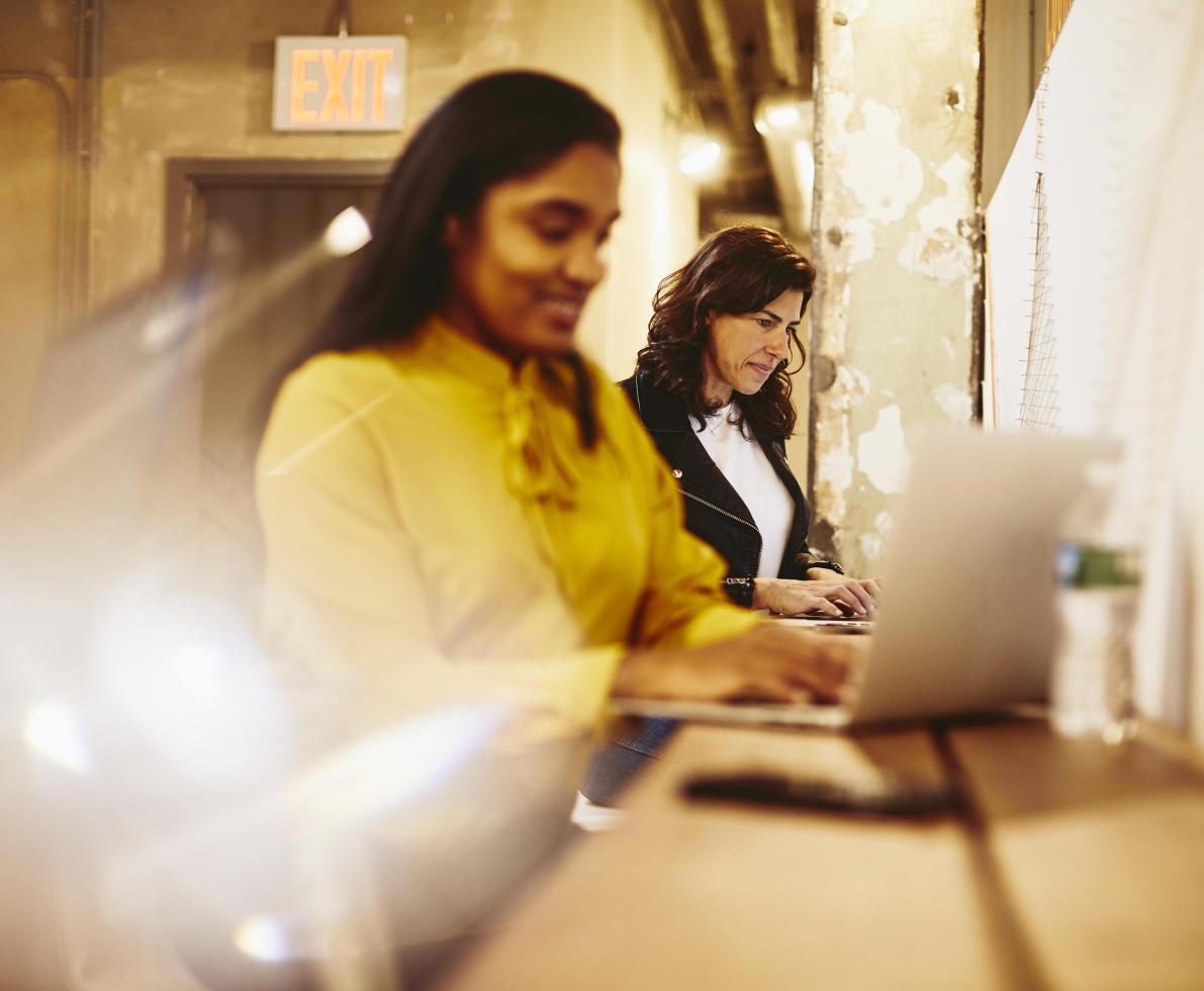 Women working on their laptops